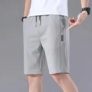 Летние мужские спортивные шорты 2024 года, однотонные, с прямым рисунком, свободного типа, повседневные шорты с эластичной резинкой на талии, штаны для бега трусцой